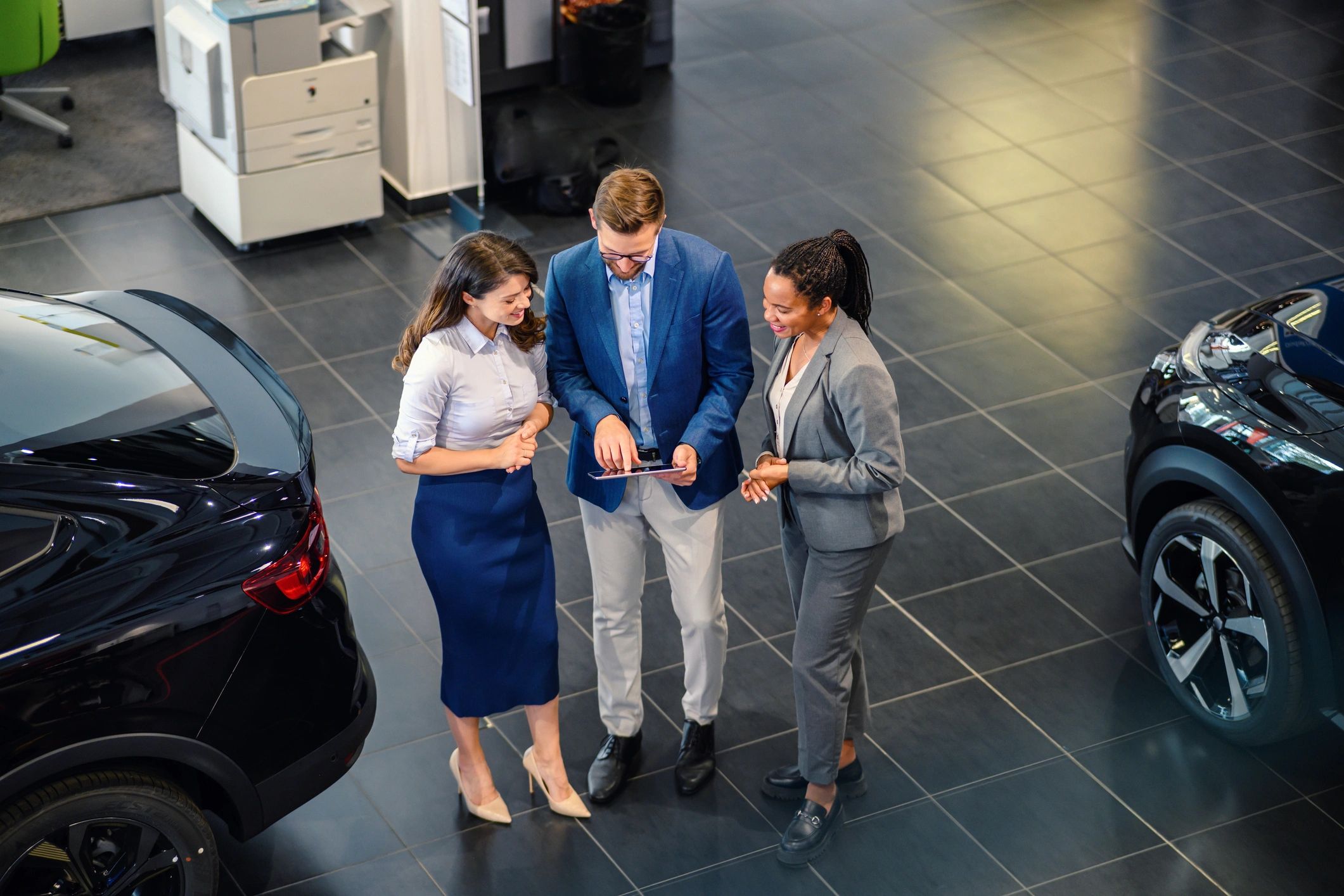 modern car dealership team